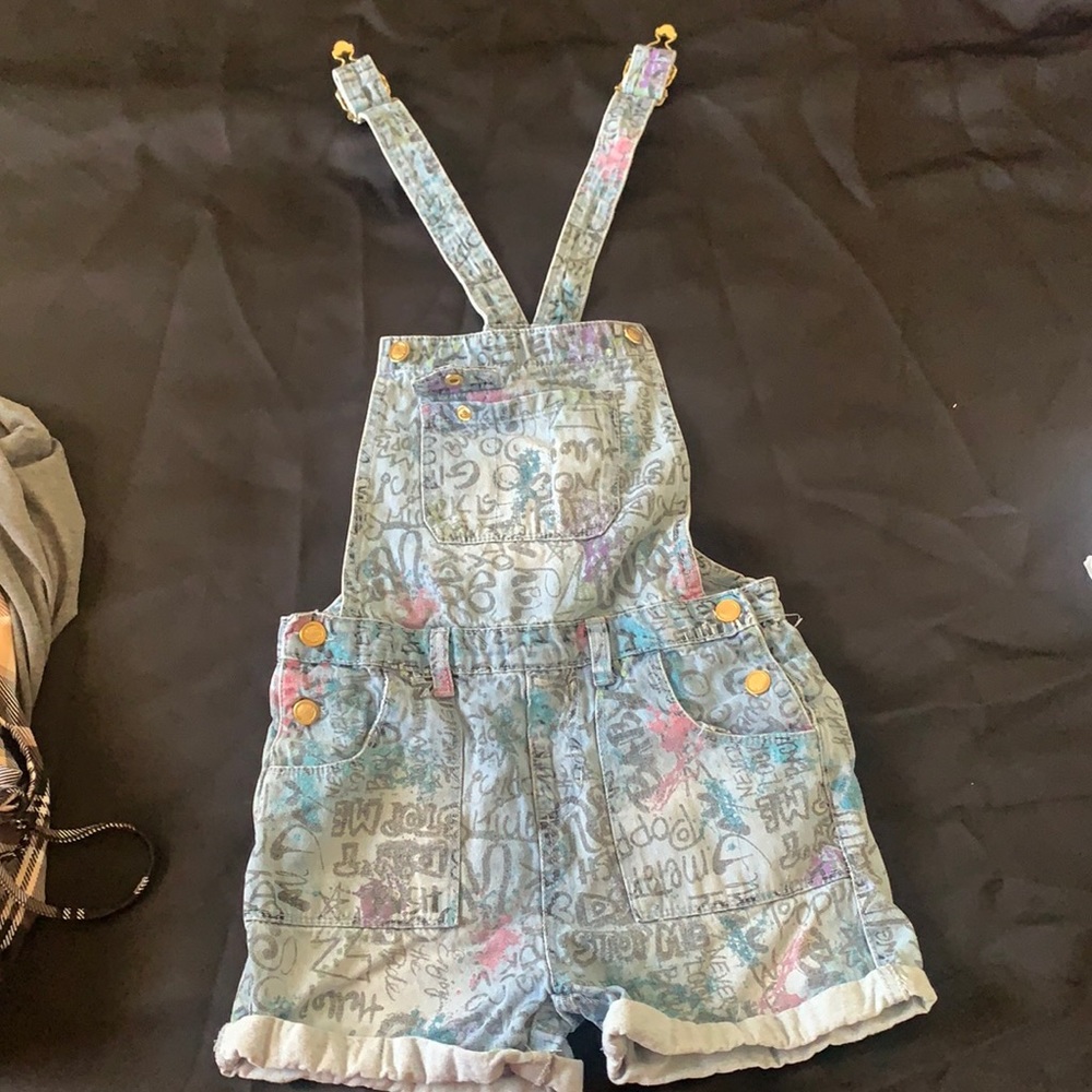 Overalls with written design all over